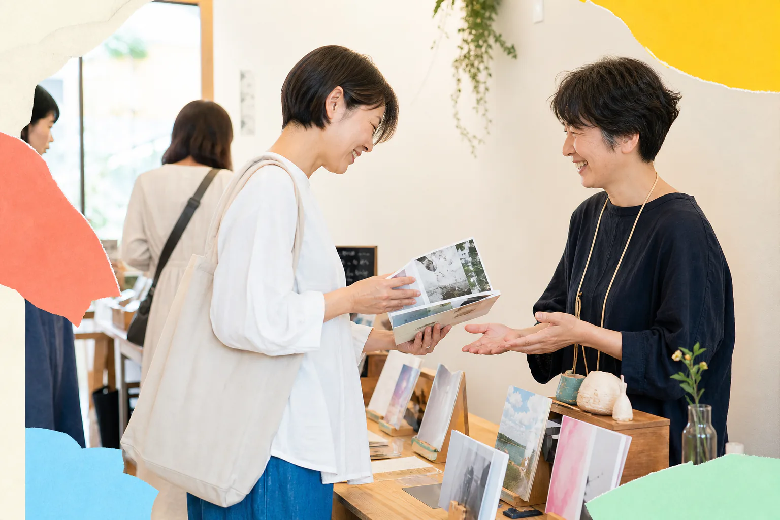 来場者が作品を手に取り出店者と会話する場面をイメージしたビジュアル